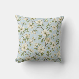 Coussin Motif de fleur de cornouiller du Sud sur fond bleu