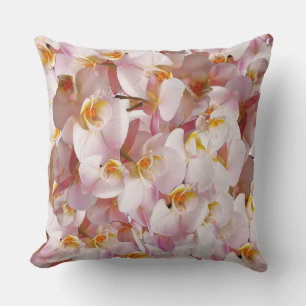 Coussin motif de fleurs de couleur rose