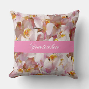 Coussin motif de fleurs de couleur rose