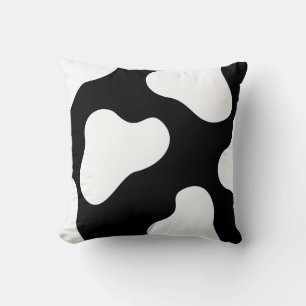 coussin motif de vache noir et blanc