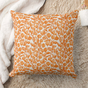 Coussin motif floral à orchidées orange