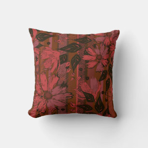Coussin Motif floral noir et rouge.