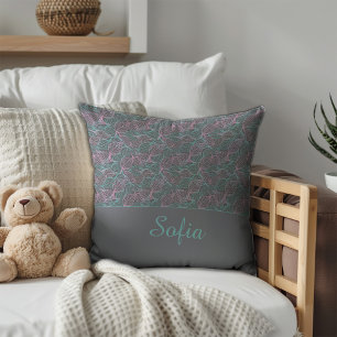 Coussin Motif gris de feuilles stylisées rose et turquoise