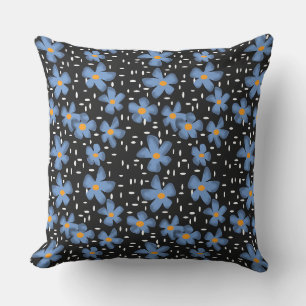 Coussin Motif rustique avec fleurs bleues sur fond noir