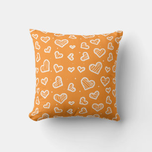 Coussin Motif sans couture de cœurs artistiques sur orange