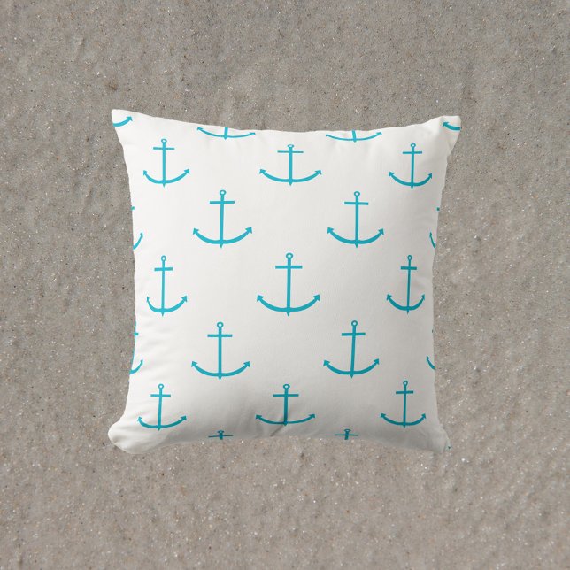 Coussin Motif Turquoise Ancre (A throw pillow with a pattern of turquoise anchors)