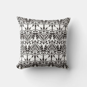 Coussin motif vintage avec nom fleuri et géométrique