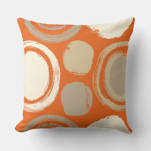 Coussin Motifs circulaires abstraits sur fond orange