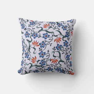 Coussin Motifs floraux bleus vibrants avec vignes vertes