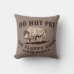 Coussin Ne touchez pas aux bisons aux airs de vaches du Da