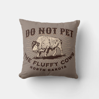 Coussin Ne touchez pas aux bisons aux airs de vaches du Da