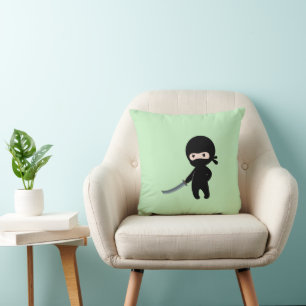 Coussin Ninja minuscule en colère sur vert
