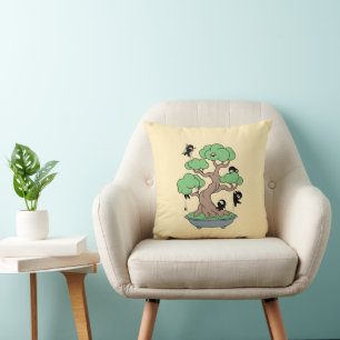 Coussin Ninjas minuscules en bonsaï sur jaune