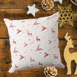 Coussin Noël aux rennes roses et aux flocons de neige