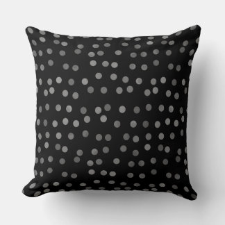 Coussin noir avec des points gris
