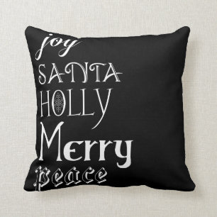 Coussin noir de mots de Noël de Père Noël de joie