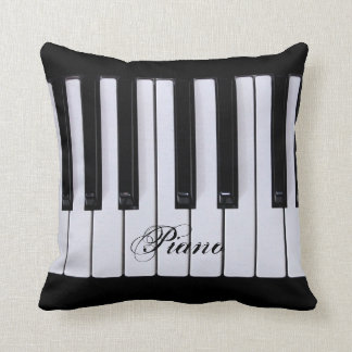 Coussin noir et blanc de clés de piano