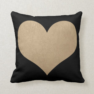 Coussin noir et coeur de cuir d'or de faux
