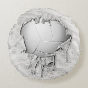 Coussin noir rond de volley-ball déchiré