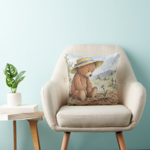 Coussin Nounours regardant une marguerite en croissance