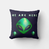 Coussin "Nous sommes ici" tête d'alien vert (Recto)