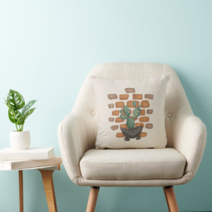 Coussin Oasis de Cactus : Décor de mur de briques inspiré
