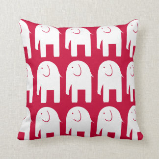 Coussin Objets superflus sur le rouge