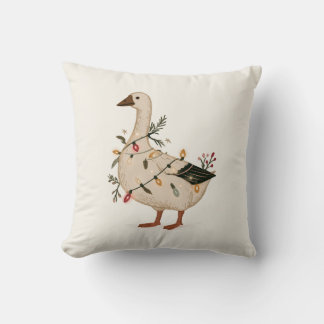 Coussin Oie rétro avec guirlande lumineuse et verdure hive