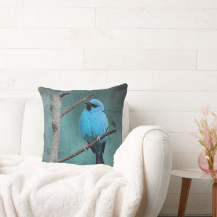 Coussin Oiseau bleu sur une branche en techniques mixtes