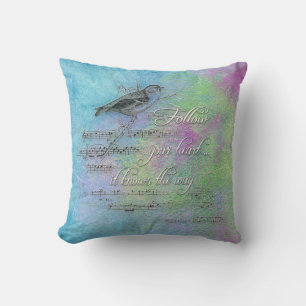 Coussin oiseau et musique avec une citation inspirante