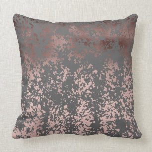 Coussin or rose de faux élégant et traçages gris