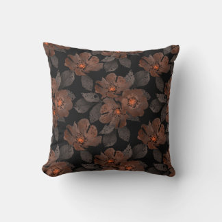 Coussin Orange and brown flowers on a black background.