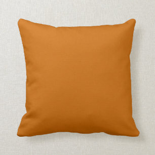 Coussin orange de brun de rouille coloré par