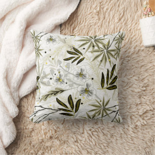 Coussin Orchidées blanches aux feuilles tropicaux d'olivie