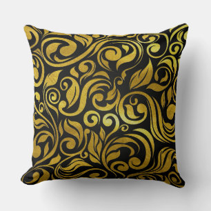 Coussin orné noir et or