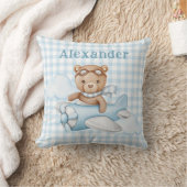 Coussin Ours bleu Teddy dans l'avion (Couverture)