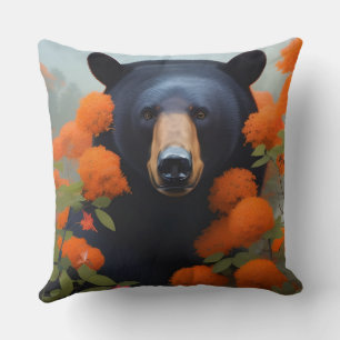 Coussin Ours noir dans des fleurs orange
