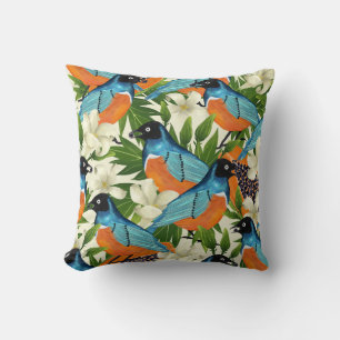 Coussin papaye tropicale et motif d'oiseaux.