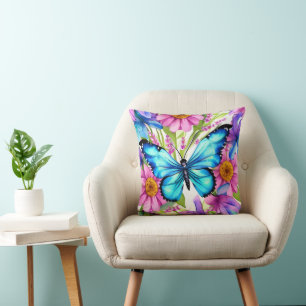 Coussin Papillon bleu dans un champ de fleurs