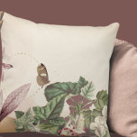 Coussin Papillon de la cuisse de chatte ivoirienne crémeus<br><div class="desc">L'oreiller à jetons d'ivoire présente une belle impression botanique dans une palette de couleur ivoire crémeuse aux accents bordeaux, or et vert. Une étonnante impression botanique composée de couches de griffe de chat comme point focal encadrée par des amaryllis stylisés avec des éléments de conception or faible; la composition stratifiée...</div>