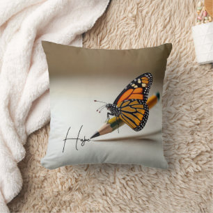 Coussin Papillon Espoir et Monarque sur un Crayon