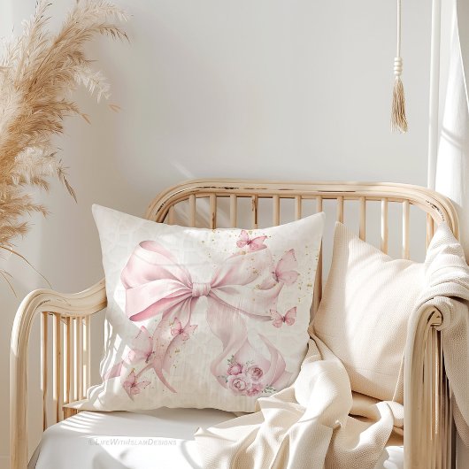 Coussin Papillons au Nœud Rose Photo