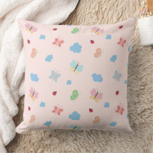 Coussin Papillons et coccinelles au pastel doux