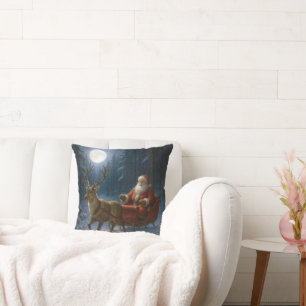 Coussin Père Noël conduisant un traîneau au clair de lune
