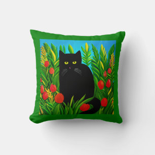 Coussin Petit chat noir dans un jardin de tulipes