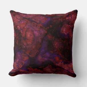 Coussin Pierre rouge et violet abstrait