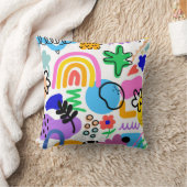 Coussin pillows with colorful abstract designs (Couverture)