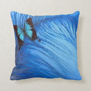 Coussin plume bleue de papillon