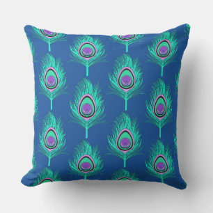 Coussin Plumes de paon, Aqua sur le bleu profond de Cobalt