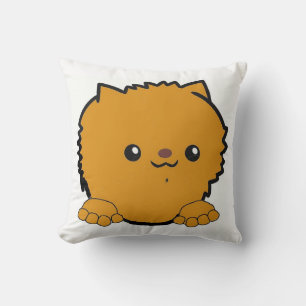 Coussin poméranien qui regarde orange